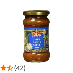 Glas mit würziger Tikka Masala Sauce, vegan und glutenfrei, bereit für ein authentisches indisches Gericht.